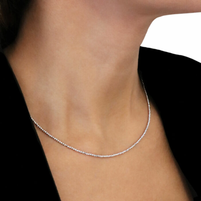 Collier boules or blanc